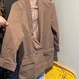 Women’s brand new  single button blazer.